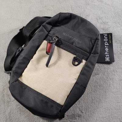 Bolso Bandolera Sherpani Metro AT Antirrobo Eslinga Paja Negro Viaje Para Mujer Foto 1 de 4