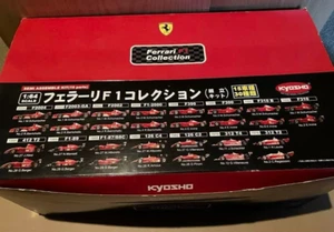 Kyosho 1/64 Ferrari F1 Collection ver.1 Limited Random Kit Set di 18 JP mai aperti - Foto 1 di 2