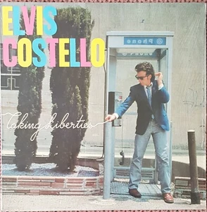 ELVIS COSTELLO TAKING LIBERTIES FIRST PRESSING VINYL LP FROM CANADA, MINT - Picture 1 of 2