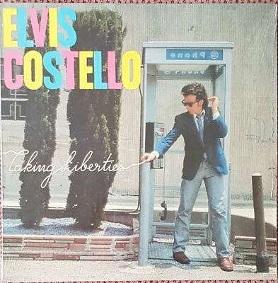 ELVIS COSTELLO TAKING LIBERTIES FIRST PRESSING VINYL LP FROM CANADA, MINT - Image 1 of 2