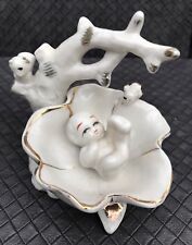 Rare Chinese  ornament with a  baby in a bird bath on a tree white and gold.
