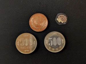 Two types of Japanese 500 yen coins (2013 & 2022) and one 10 yen coin (2024) - Picture 1 of 2