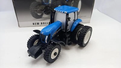 ERT13655 ERTL New Holland TG255 Tractor 2003 1/32, confezione lievemente usu - Immagine 1 di 4