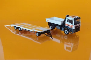 Herpa 318730 MAN TGS NN Dreiseitenkipper mit Kran und TU3-Anhänger "Strabag" NEU - Picture 1 of 2