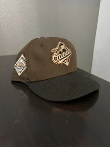 New Era Baltimore Orioles 25th Anniversary Coffee Peach Edition Hat 7 5/8 Fitted - Picture 1 of 10