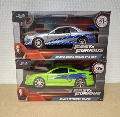 Lotto 2 Mitsubishi Eclipse Brian's + Nissan GT-R34 1/32 Jada Nuovo Scatola Or... - Immagine 1 di 3