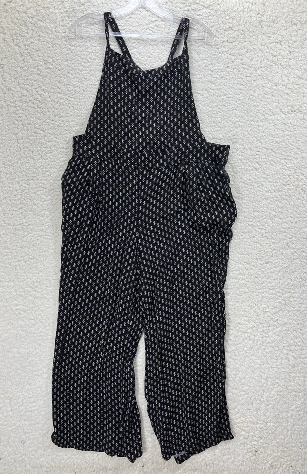 Mono para mujer tórrido negro floral crepé pierna ancha sin espalda Plus 2X Foto 1 de 4