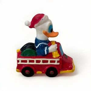 Vintage Donald Duck Xmas Santa's World Walt Disney Fire Truck Ornament Adler - Picture 1 of 7