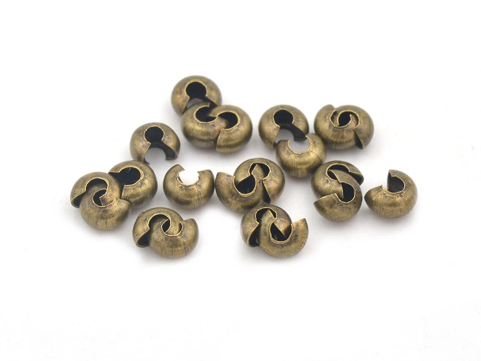 Coverperlen in antik bronze, geschlossen 4mm 20 Stück - Bild 1 von 3