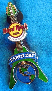 CAYMAN IS EARTHDAY SPINNING PLANET GLOBE FLYING V GUITAR 06 Hard Rock Cafe PIN - Picture 1 of 1
