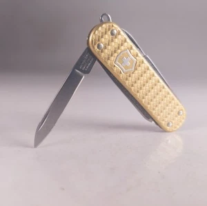 Victorinox Swiss Army Knife Classic SD 58mm PRECIOUS ALOX Brass Gold - Picture 1 of 5
