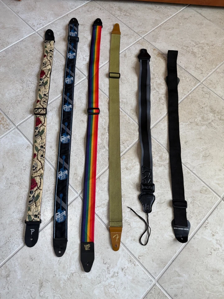 Gibson EE. UU./Fender Tweed/Perri Jaqcuard/Ernie Ball+ Lote de correas de guitarra Foto 1 de 4