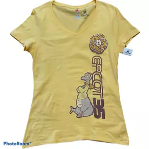 T-shirt scollo a V gialla figura 35 anniversario Disney Parks EPCOT 35 anni nuova con etichetta - donna XS - Foto 1 di 8