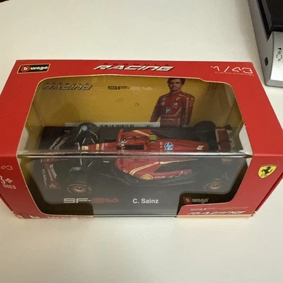 Coche de carreras de metal Bburago 1:43 F1 Formula SF24 Ferrari modelo NO.55 Carlos Sainz Foto 1 de 4