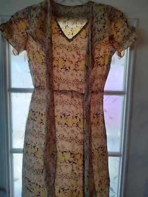 Vestido hecho a mano vintage de seda de la depresión de los años 30, multicolor, ganchos laterales y ojos. Foto 1 de 4