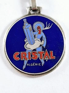Schlüsselanhänger - Kristall Algeria Anislikör - Metall Emaille Augis St - Bild 1 von 3