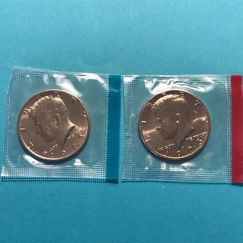 1973 P&D Kennedy Half Dollars Unc in US Mint Cello Cover