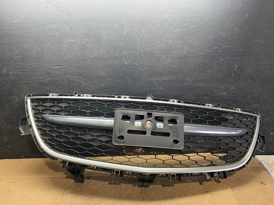 Mazda CX9 CX-9 2010 2011 2012 parrilla inferior delantera emblema OEM T6763 DG Foto 1 de 4