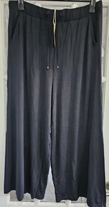 NEXT schwarze stretchige bequeme Cropped-Hose weites Bein mit Taschen – UK 16–18 - Bild 1 von 5