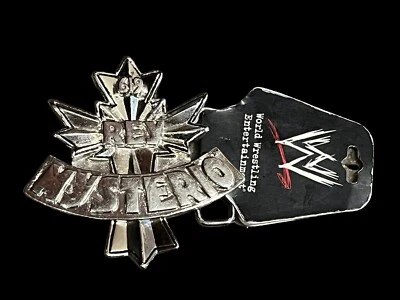 WWE REY MYSTERIO HEBILLA DE CINTURÓN CROMADA CON LICENCIA CON ETIQUETAS ¡NUEVO! 619 fans lucha libre Foto 1 de 2