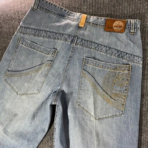 Pantalones de mezclilla Timberland vintage para hombre 36 Y2K hip hop holgados patinador ropa de calle bordados - Imagen 1 de 15