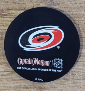 Captain Morgan Puck Coaster NHL Carolina Hurricanes - Picture 1 of 1