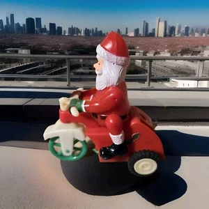 Spielzeug Weihnachtsmann auf Dreirad Schiebespielzeug Hongkong Vintage Kinderspielzeug - Bild 1 von 10