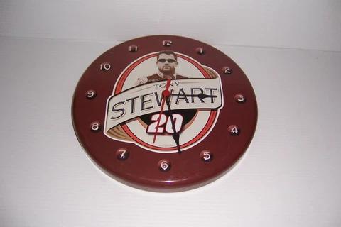 NASCARS TONY STEWART ROUND METAL WALL CLOCK 12" DIAMETER Cover