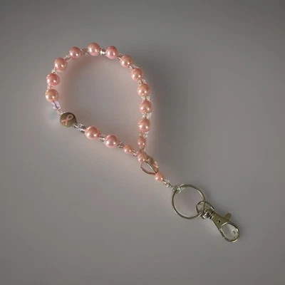 Correa de muñeca rosa perla cáncer de mama correa para teléfono celular correa para cámara monedero encanto Foto 1 de 4