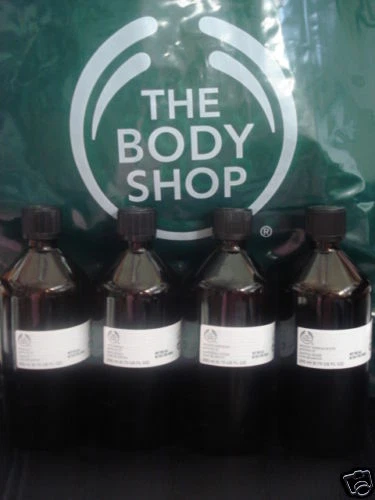 The body shop PERFUME OIL - WOODY SANDALWOOD 200 ML. DISCONTINUED - Image 1 of 1