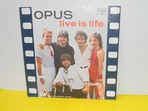 SINGLE 7" - OPUS - LIVE IS LIFE - AGAIN AND AGAIN - Bild 1 von 3
