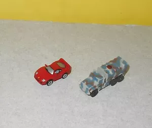Camión militar Micro Machines EE. UU. Galoob 1995 LGTI gris marrón camuflado con 94 Ferrari - Imagen 1 de 3