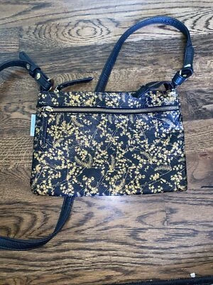 Bolso con correa floral negro y dorado de papaya Foto 1 de 4