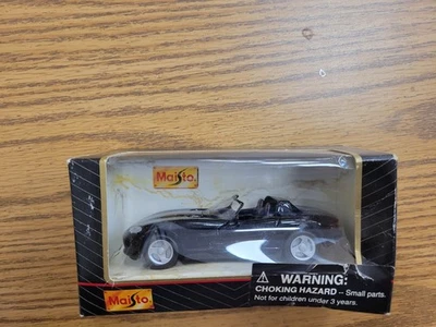 Coche diecast convertible negro escala 1:18 Maisto edición especial años 90 de colección 1992 Foto 1 de 3