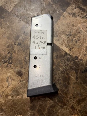 Cargador redondo Smith & Wesson 4516-1 .45 ACP 7 OEM S&W SW Foto 1 de 4