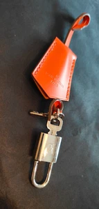 Louis Vuitton Padlock Silver plated Metal with Clochette Orange Leather Logo - Picture 1 of 9