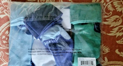 Paquete de 4 calcetines de compresión Copper Life EcoCool Ultraguard anchos sobre la pantorrilla - grandes. Foto 1 de 4