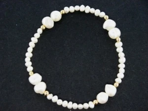 SCHMUCKJAGD GUMMIZUG ARMBAND MIT SUESSWASSERPERLEN - Bild 1 von 2
