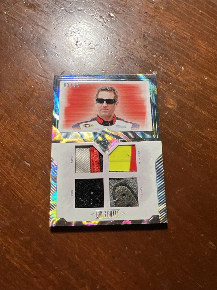 Greg Biffle 2014 Total Memorabilia Quad Swatch Melting #TM-GB #2/25 - Image 1 of 1