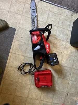 Sierra de cadena Snapper SC60v. Viene con 1 batería y cargador Foto 1 de 4