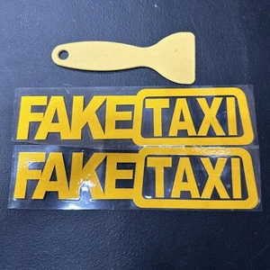 2 Pack FAKE TAXI Car Auto Sticker FAKETAXI Decal 8” by 2” Yellow W/ Tool - Picture 1 of 9