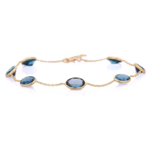 Lab Created 6 Ct Oval Blue Topaz Bezel Set Station Anklet 14K Yellow Gold Plated - Picture 1 of 5