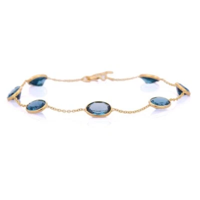 Lab Created 6 Ct Oval Blue Topaz Bezel Set Station Anklet 14K Yellow Gold Plated - Image 1 of 4