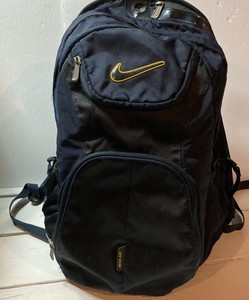 gold nike bag