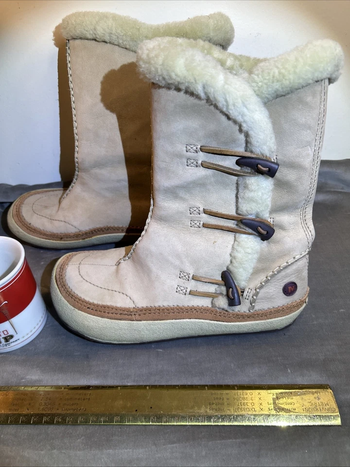 Botas altas Merrell Spirit Tibet para mujer talla 7 gamuza tostada Polartec Thinsulate usadas en excelente estado Foto 1 de 4