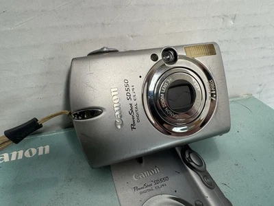 Câmera digital Canon PowerShot SD550 ELPH 7.1MP prata e bateria testadas - Imagem 1 de 4