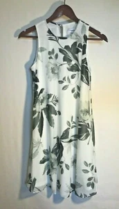 CALVIN KLEIN DRESS WHITE WITH BLACK FLOWERS PRINT CHIFFON TRAPEZE SIZE 2 - Imagen 1 de 9