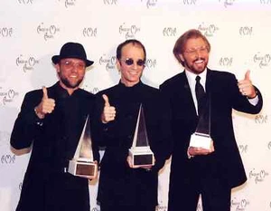 Bee Gees Barry Gibb Maurice Gibb Robin Gibb 11.7x16.5 Glossy Photo Poster - Picture 1 of 1