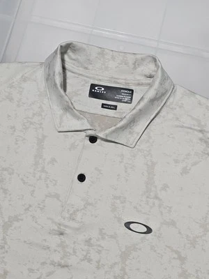 Polo de golf Oakley Hydrolix camuflado para hombre talla mediana Foto 1 de 4