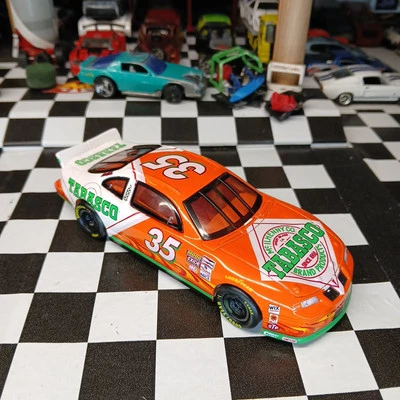 Pontiac Grand Prix #35 Tabasco Todd Bodine 1997 Hot Wheels Pro Racing escala 1:43 Foto 1 de 4